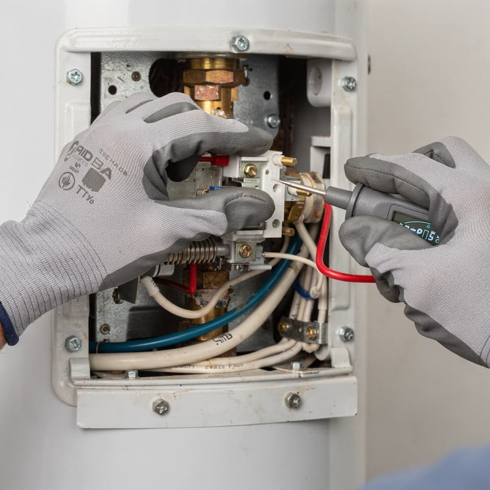 Electric water heater element and thermostat inspection in Boston